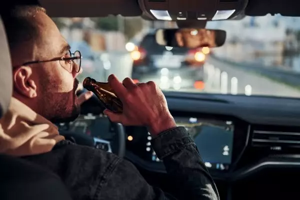 dont-drink-drive-rear-view-handsome-unshaved-man-fashionable-clothes-inside-his-automobile