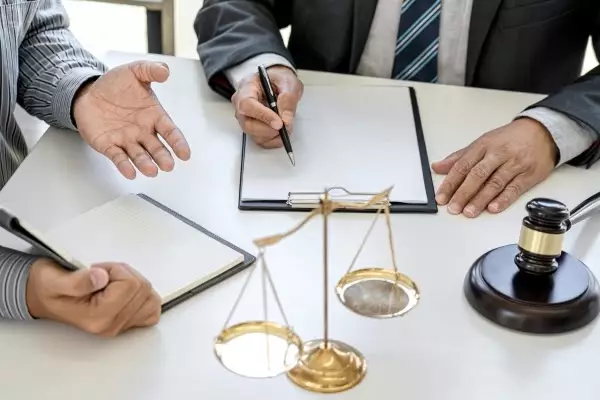 judge-gavel-with-scales-justice-businessman-lawyer-counselor-consulting-discussing-contract-papers-law-firm-office